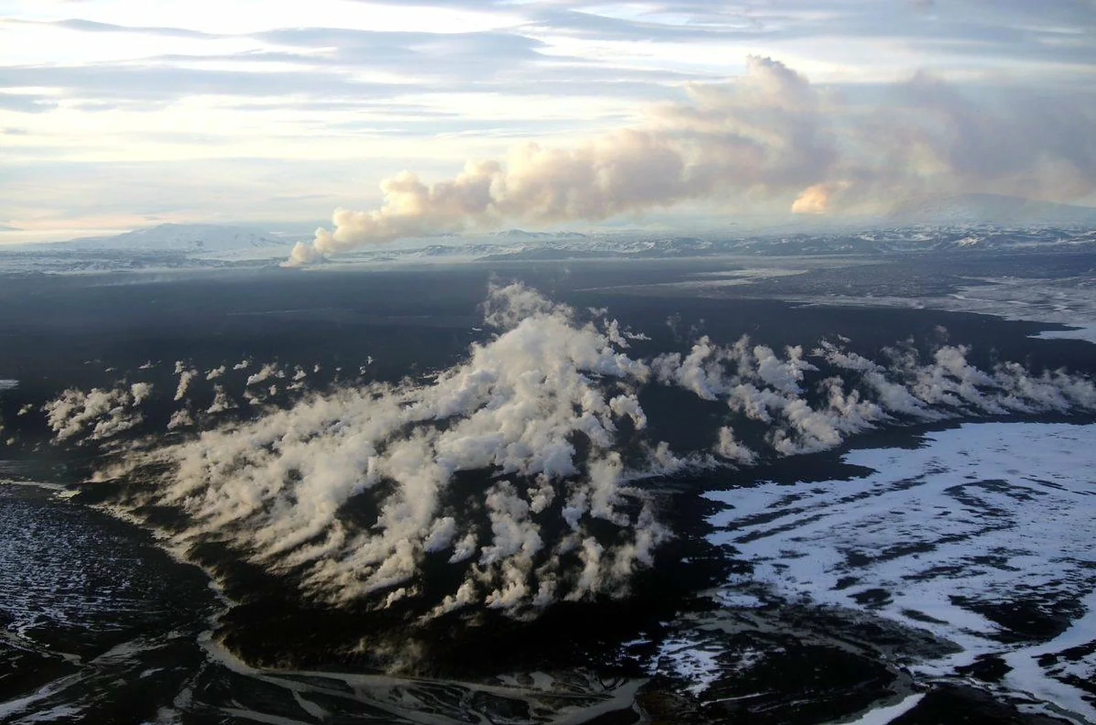 Aerial view of Holuhraun lava flow-field with steam vents, Iceland